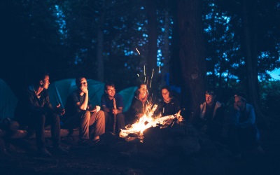 people around campfire