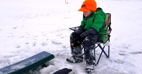 child ice fishing