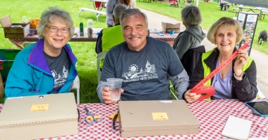 Volunteers collect money for an event