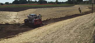 Putting in Erosion Control Mat at Badger Prairie